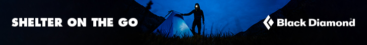 a Black diamond ad showing a man at a tent with a headlamp on in the dark