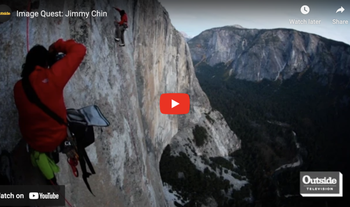 video cover image of the video showing a photographer taking a photo on a cliff