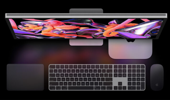 studio image of an Apple Mac mini and monitor and keyboard