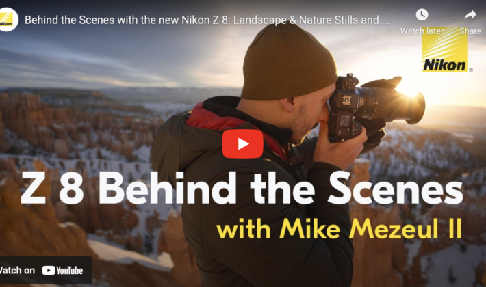 video cover image of a man taking a photograph