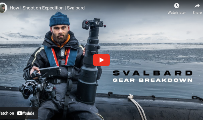 video cover image of a man holding cameras